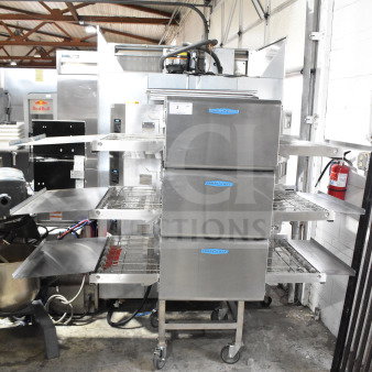 Turbochef HCW2620 conveyor rapid cook oven on casters, electric, 208/240V, 3-phase. Appears in good condition.