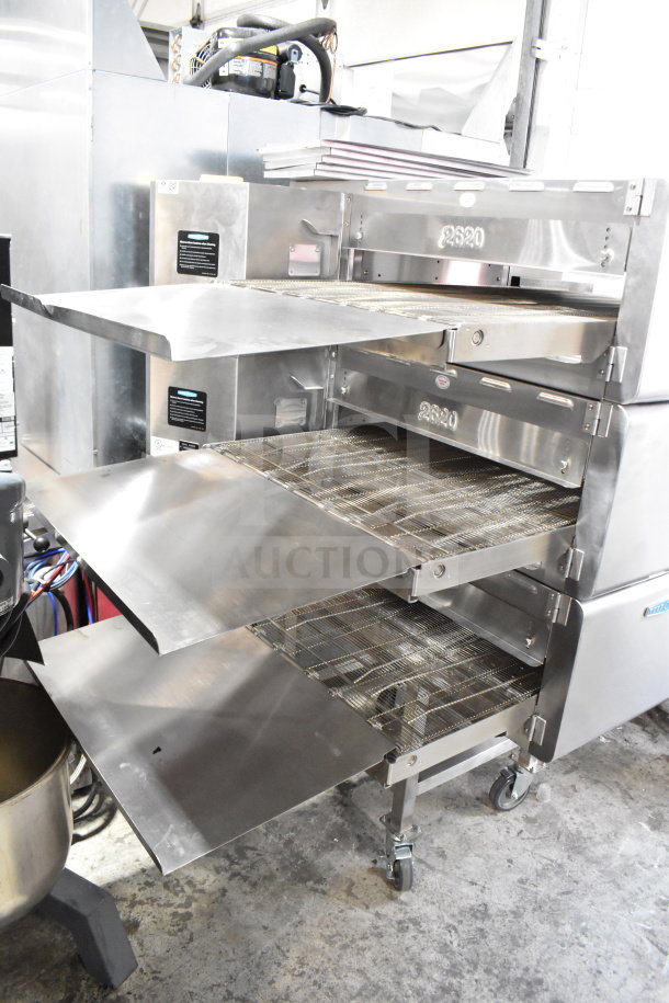 Turbochef HCW2620 commercial electric conveyor oven on casters, 208/240V, 3-phase, stainless steel, visible model marking.