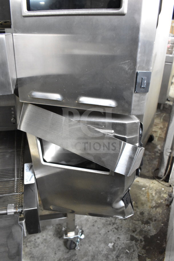 Turbochef HCW2620 commercial conveyor rapid cook oven, stainless steel, on casters, visible control panel and conveyor belt.