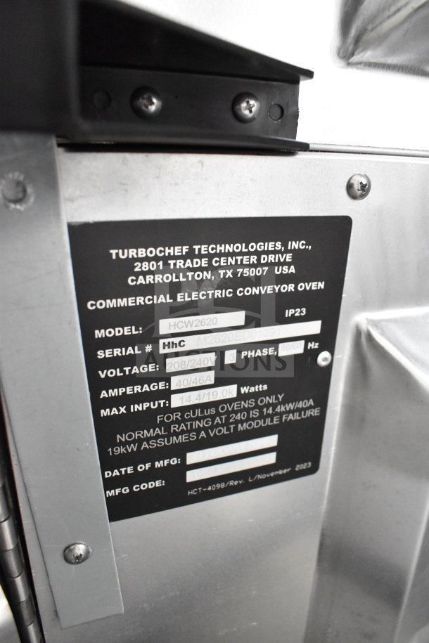 Turbochef HCW2620 commercial electric conveyor rapid cook oven label, model, voltage, and serial details visible.