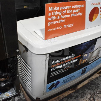 Generac Guardian 22kW natural gas standby generator, white, promotional signage visible, excellent for power outages.