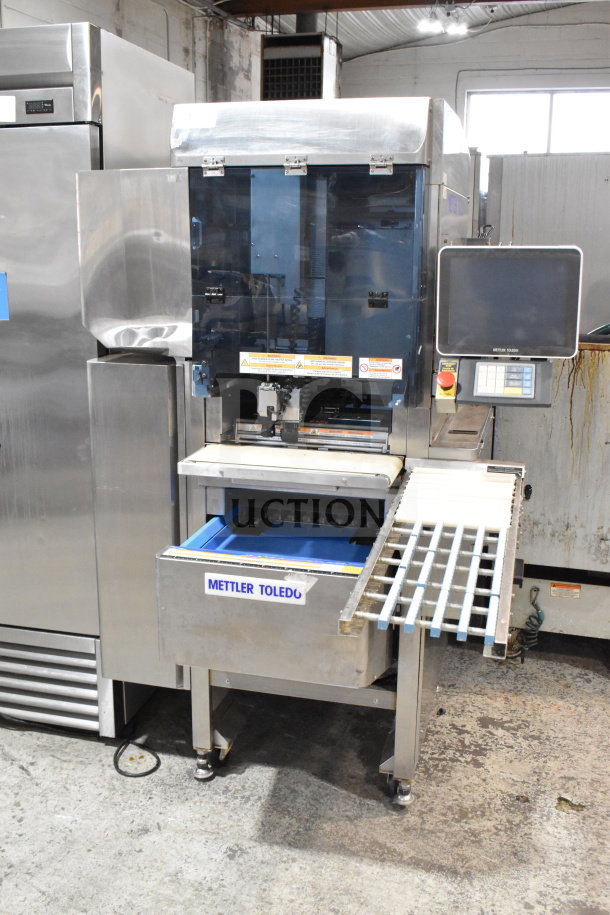 Mettler Toledo 880 Auto wrapping machine, commercial floor style, automatic, 200-240V, stainless steel finish, digital display.