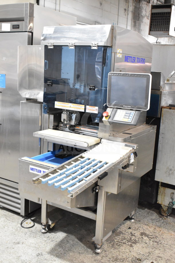 Mettler Toledo 880 Auto Commercial Floor Wrapping Machine, stainless steel, with control panel. Voltage: 200-240V.