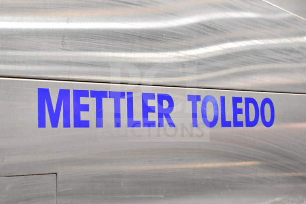 Mettler Toledo 880 Auto wrapping machine, commercial floor style, 200-240V, logo on metallic surface.