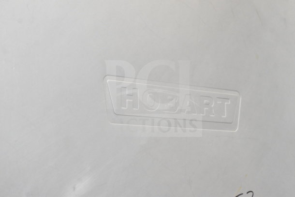 Hobart 6801 Commercial Meat Saw plate with embossed logo, 200-230V, 3 Phase. Durable metal construction.