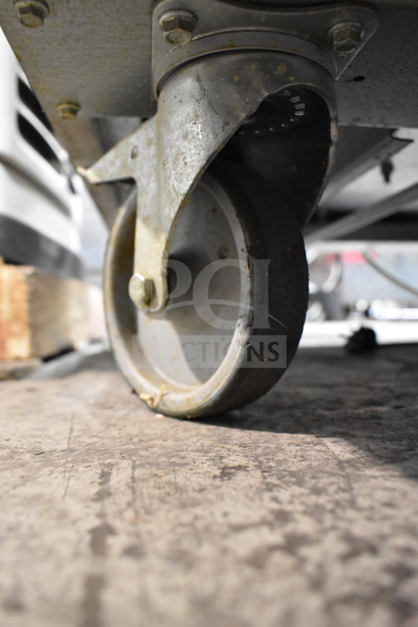 Close-up of a caster wheel on the 2022 Desmon GBF-15+ETL commercial blast chiller. 220V, 3 phase.