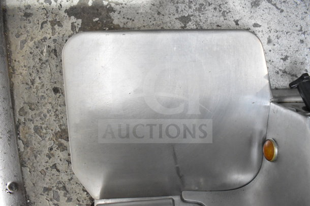 Globe Commercial Countertop Meat Slicer with blade sharpener detail, stainless steel, used condition, 115V, 1 Phase.