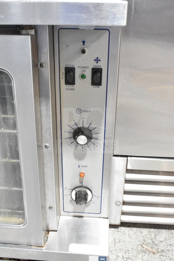 Garland SDG 1 convection oven with view-through doors, thermostatic controls, metal legs, and 80,000 BTU capacity.