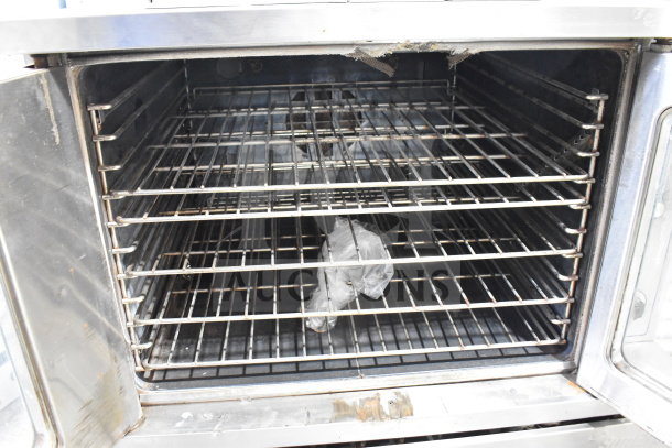Garland SDG 1 commercial convection oven, view-through doors, metal racks, natural gas, 80,000 BTU, shown in fair condition.