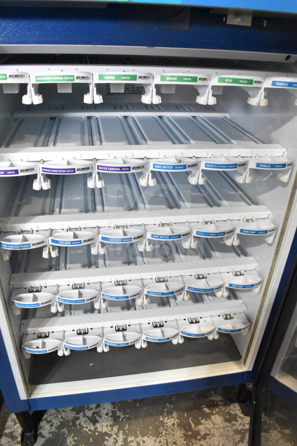 Minus Forty 11-CSGF-X1-1C000-BL-FREAL mini cooler merchandiser, 115 volts, 1 phase, with labeled product slots.