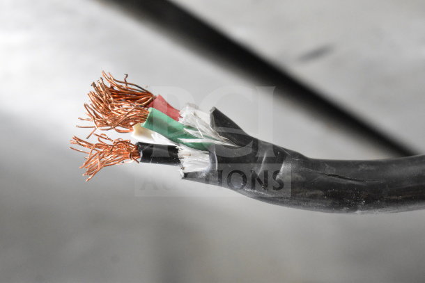 Damaged power cable for Fetco CBS-52H15 coffee machine, showing exposed copper wires and torn insulation.