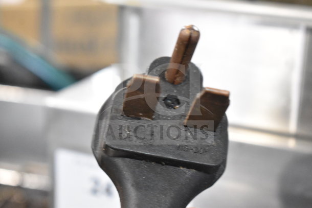 Plug of Cooking Performance Group DF-18-2 electric fryer, 30 lb. capacity, 208/240V, 1 Phase, with visible markings.