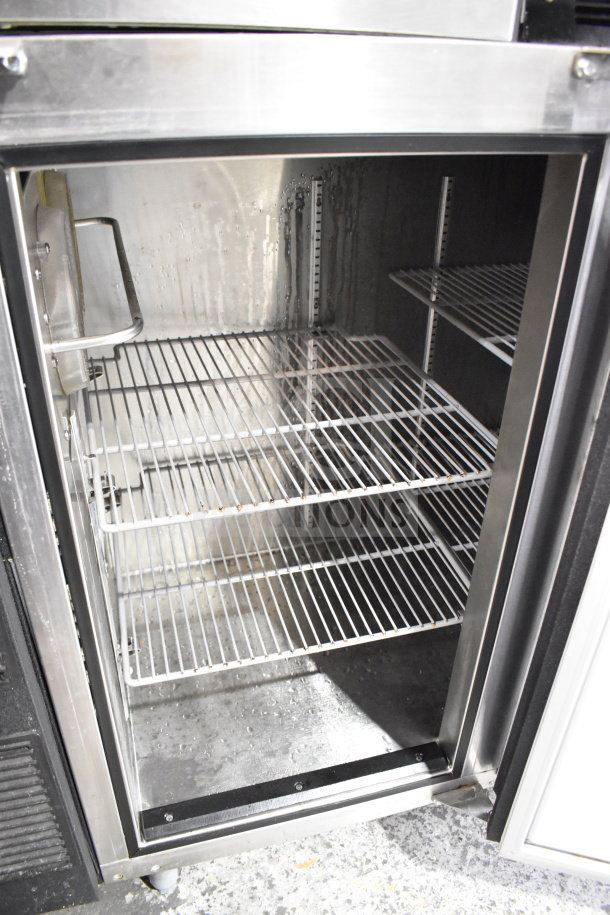 Glastender ND72-L1-BN 3-door back bar cooler, stainless steel, clean interior, adjustable shelves, 115 volts, 1 phase.