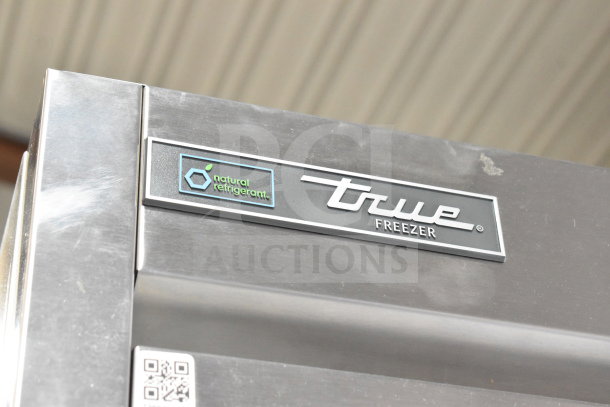 2022 True T-23F-HC commercial freezer, single door, stainless steel, natural refrigerant label, on casters.
