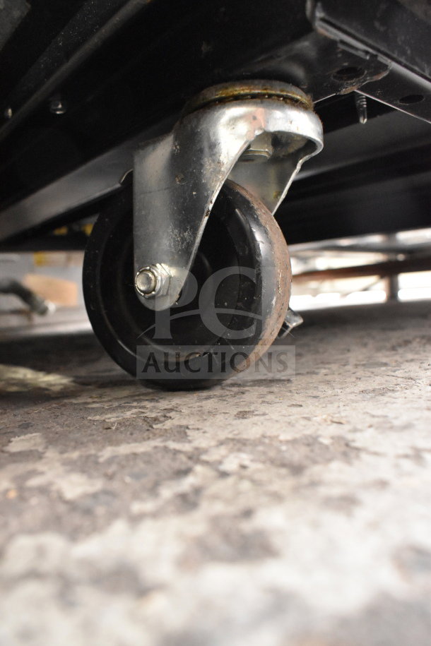 2022 True T-23F-HC commercial freezer caster wheel detail, durable and rust-resistant.