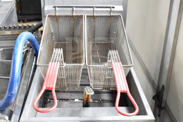 Vulcan LG300-5 deep fat fryer, natural gas, floor style, 90,000 BTU, dual baskets with red handles, commercial use.