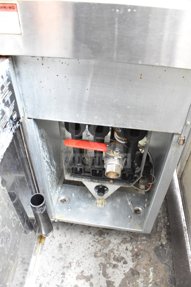 Vulcan LG300-5 fryer, natural gas, 90,000 BTU. Interior view showing pipes, knob, and red handle lever. Used condition.