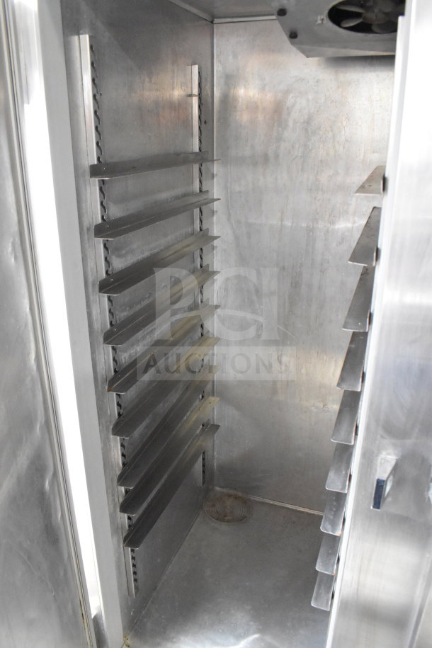 Continental 2R Commercial 2 Door Reach In Cooler, stainless steel interior, adjustable shelving, 115V, 1 Phase.