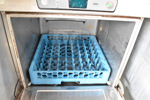 2017 Hobart LXER commercial undercounter dishwasher, 120/208-240V, 1 phase, shows interior with blue rack, used condition.