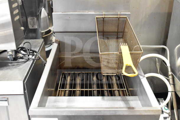 2018 Pitco Frialator 65C commercial natural gas fryer, 65 lb capacity, on casters. Includes fryer basket, 150,000 BTU.