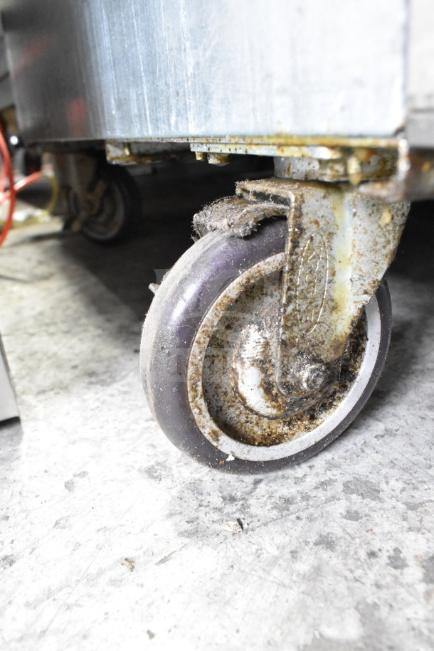 2018 Pitco Frialator 65C fryer caster, showing wear and rust, indicative of commercial use.