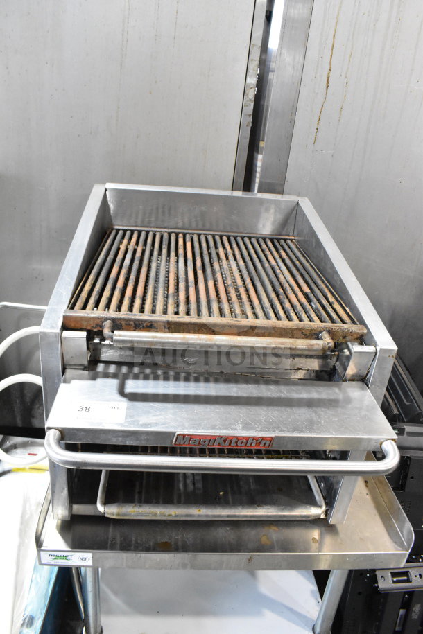 MagiKitch'n countertop gas charbroiler grill on stand with under shelf and casters, used condition, metal finish.