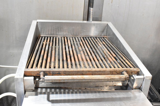 MagiKitch'n countertop gas charbroiler grill on stand with undershelf and casters; used condition.