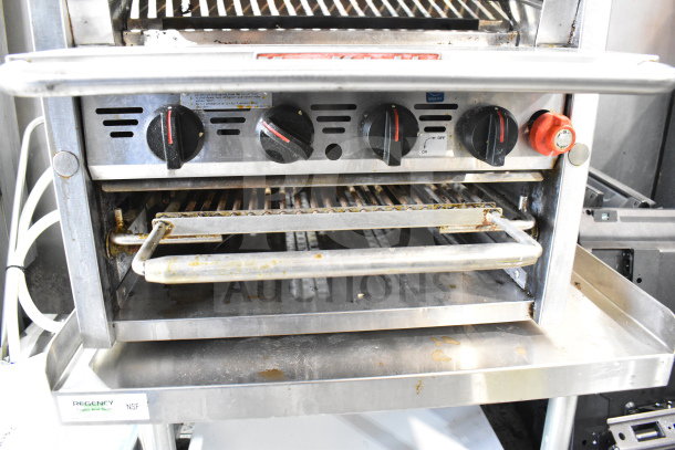 MagiKitch'n commercial countertop gas charbroiler grill on equipment stand, features under shelf, commercial casters, visible dials.