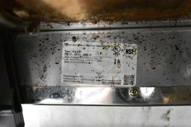 Thermoplan Mastrena M2-CS espresso machine, stainless steel, with LCD display, hoppers, steam wand, used condition.