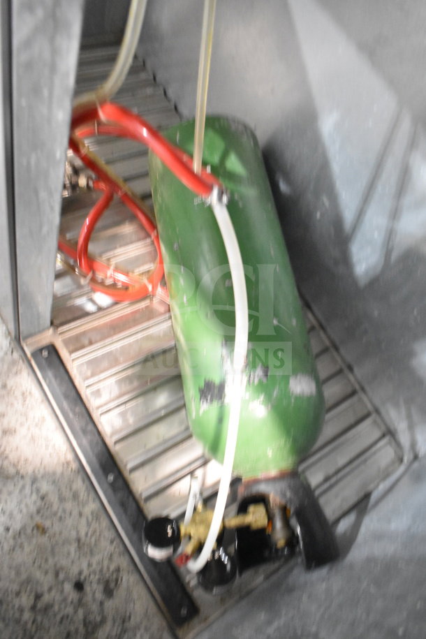 Glastender KC60-L1-BSH commercial kegerator interior, showing green cylinder with attached hoses, 115 volts, 1 phase.