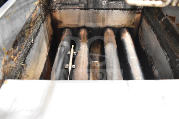 Vulcan LG400-1 deep fat fryer interior showing heating elements; natural gas, 120,000 BTU. Signs of use visible.