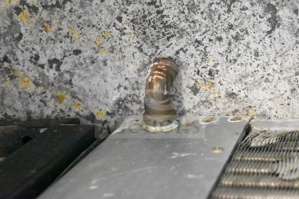 Hoshizaki F-801MAH commercial flaker ice machine head, 115-120V, 1 phase, shown with visible wear on metal surface.