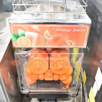Vevor 2000E4 Commercial Citrus Juicer, 110 Volts, 1 Phase. Stainless steel design, visible orange juicing components.