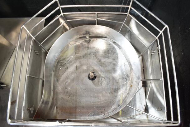 Vevor 2000E4 Commercial Citrus Juicer, stainless steel, 110 Volts, 1 Phase. Visible top view with metal finish, in used condition.