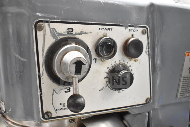 Hobart D300T 30 Quart Planetary Dough Mixer control panel with speed settings and start/stop buttons. Visible wear.