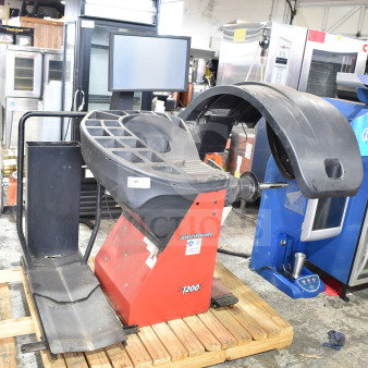 JohnBeam 1200P Commercial Floor Style Balancer, red base, 230 Volts, 1 Phase, good condition, visible brand labels.