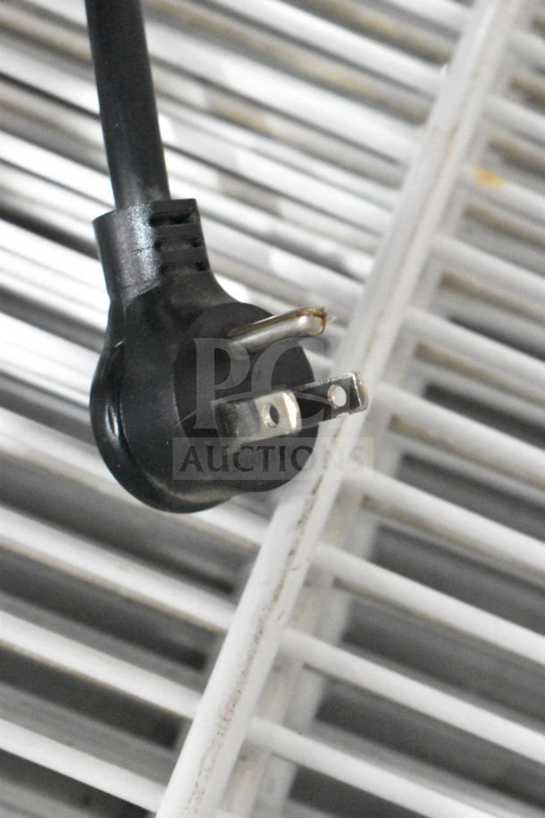 Close-up of a 115-volt plug on the 2019 True GDM-49-HC Commercial 2 Door Reach In Cooler, showing electrical detail.