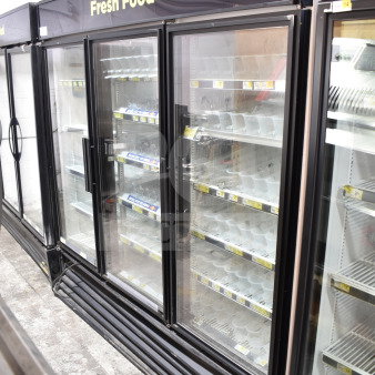 True GDM-72-LD commercial 3-door cooler merchandiser, features glass doors, black frame, tested and working condition.