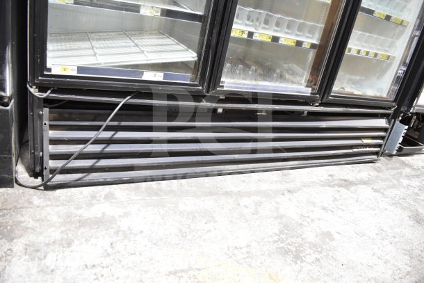 True GDM-72-LD commercial 3 door reach-in cooler, black exterior, glass doors, tested and working, 115 volts, 1 phase.