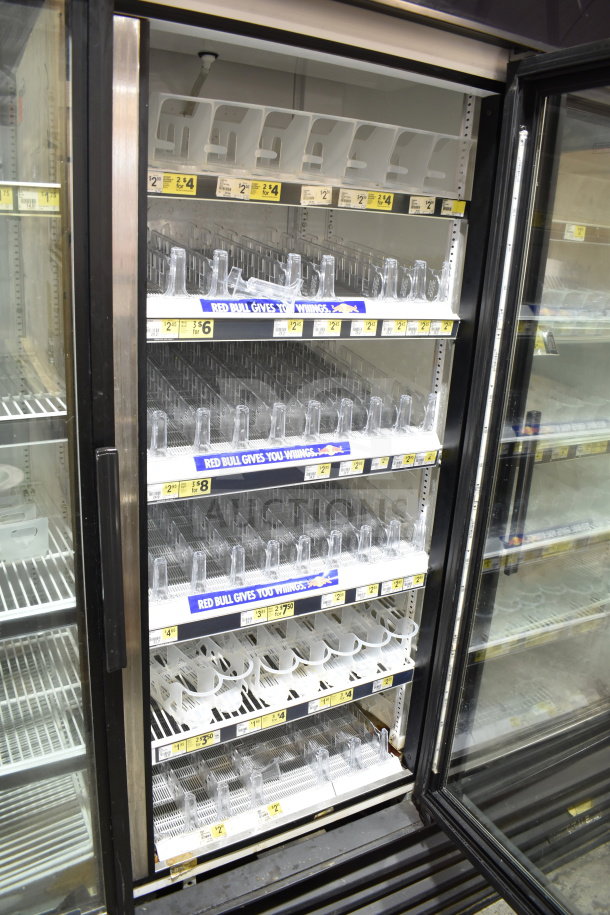 True GDM-72-LD 3 Door Reach In Cooler Merchandiser, 115 volts, tested and working, shelves with label strips shown.