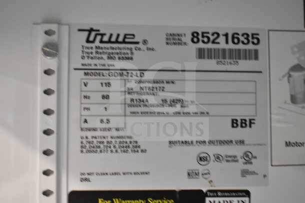 True GDM-72-LD cooler label showing model details, 115 volts, 1 phase, NSF certified, Made in USA. Cabinet serial 8521635.