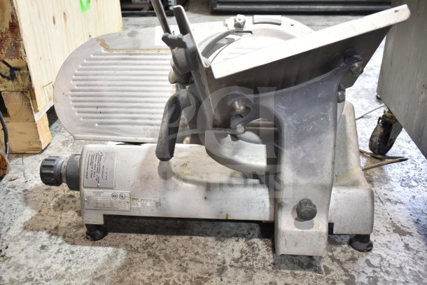 Hobart 2612 commercial countertop meat slicer, visible model and voltage label, used condition, 120 volts, 1 phase.