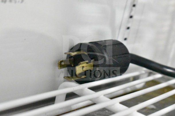 Close-up of a power plug for the 2016 True GDM-72F-HC reach-in freezer, showing electrical connection detail.