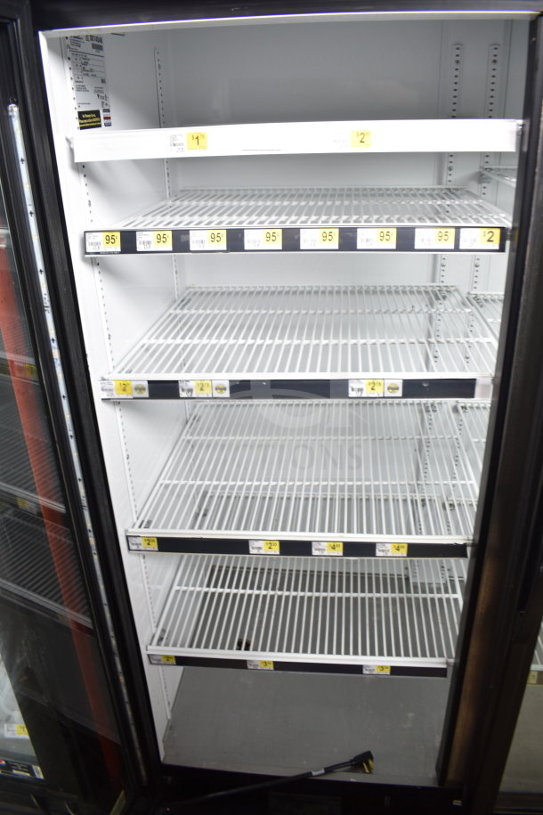 2016 True GDM-72-HC commercial 3-door reach-in cooler merchandiser, 115 volts, tested and working, clean interior shelves.