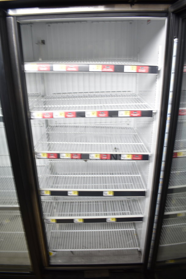 2016 True GDM-72F-HC commercial 3-door reach-in freezer, tested and working, features adjustable wire shelves.