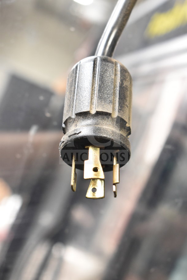 Close-up of power plug for 2016 True GDM-72F-HC Commercial 3 Door Reach In Freezer, indicating electrical compatibility.