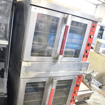 Vulcan SG4D-4 commercial ovens, view-through doors, thermostatic controls, on casters. Used condition.