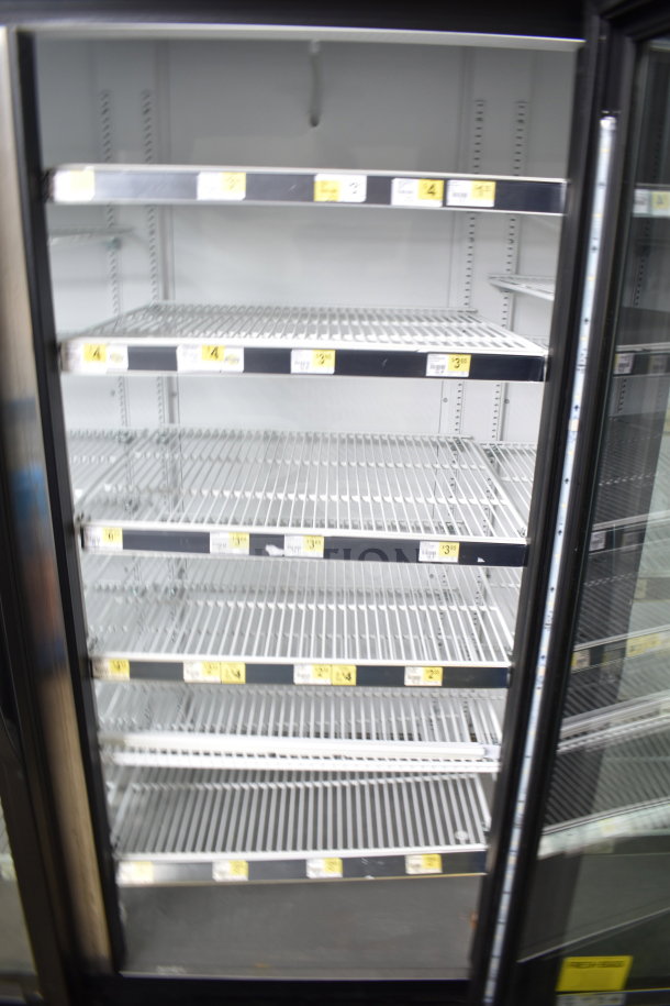 2016 True GDM-72-HC 3-door cooler merchandiser, 115 volts, tested, working, adjustable shelves, excellent condition.