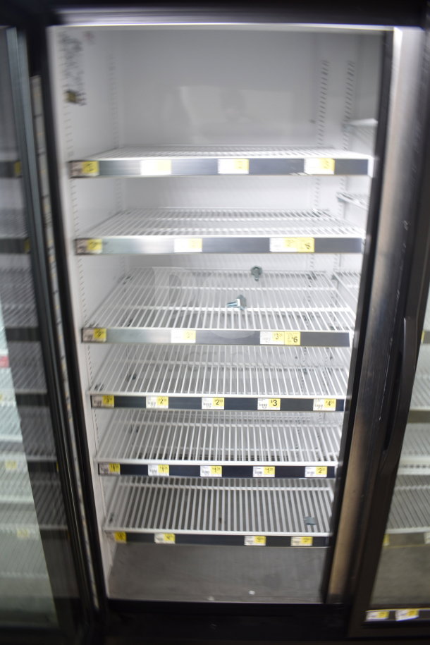 2016 True GDM-72-HC 3 door cooler merchandiser, white interior, shelving, tested working, 115V, 1 phase.
