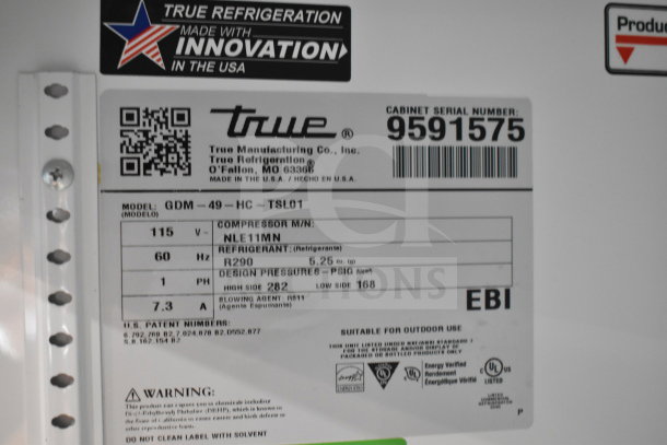 2019 True GDM-49-HC cooler label shows model, serial number 9591575, 115 volts, R290 refrigerant. Made in the USA.